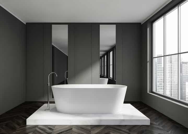 A stand alone bathtub adds a minimalist look to this Mission Viejo, CA bathroom.