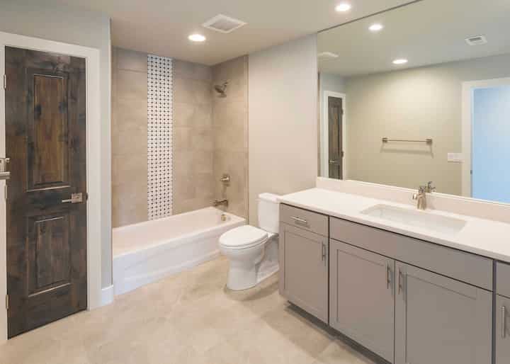 A bathtub and shower installation adds functionality to this Mission Viejo, CA home.